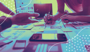 Close-up image of people having a meeting at a conference table