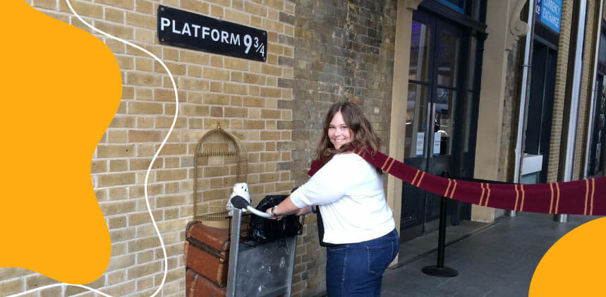 photo of courtney at platform nine and three quarters from harry potter