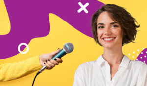 microphone being held up to a business woman
