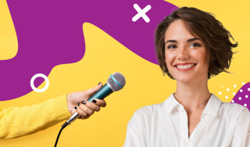 microphone being held up to a business woman
