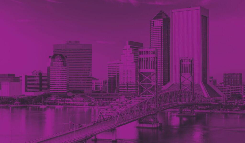 Downtown Jacksonville Florida skyline in a puple and black duotone color scheme
