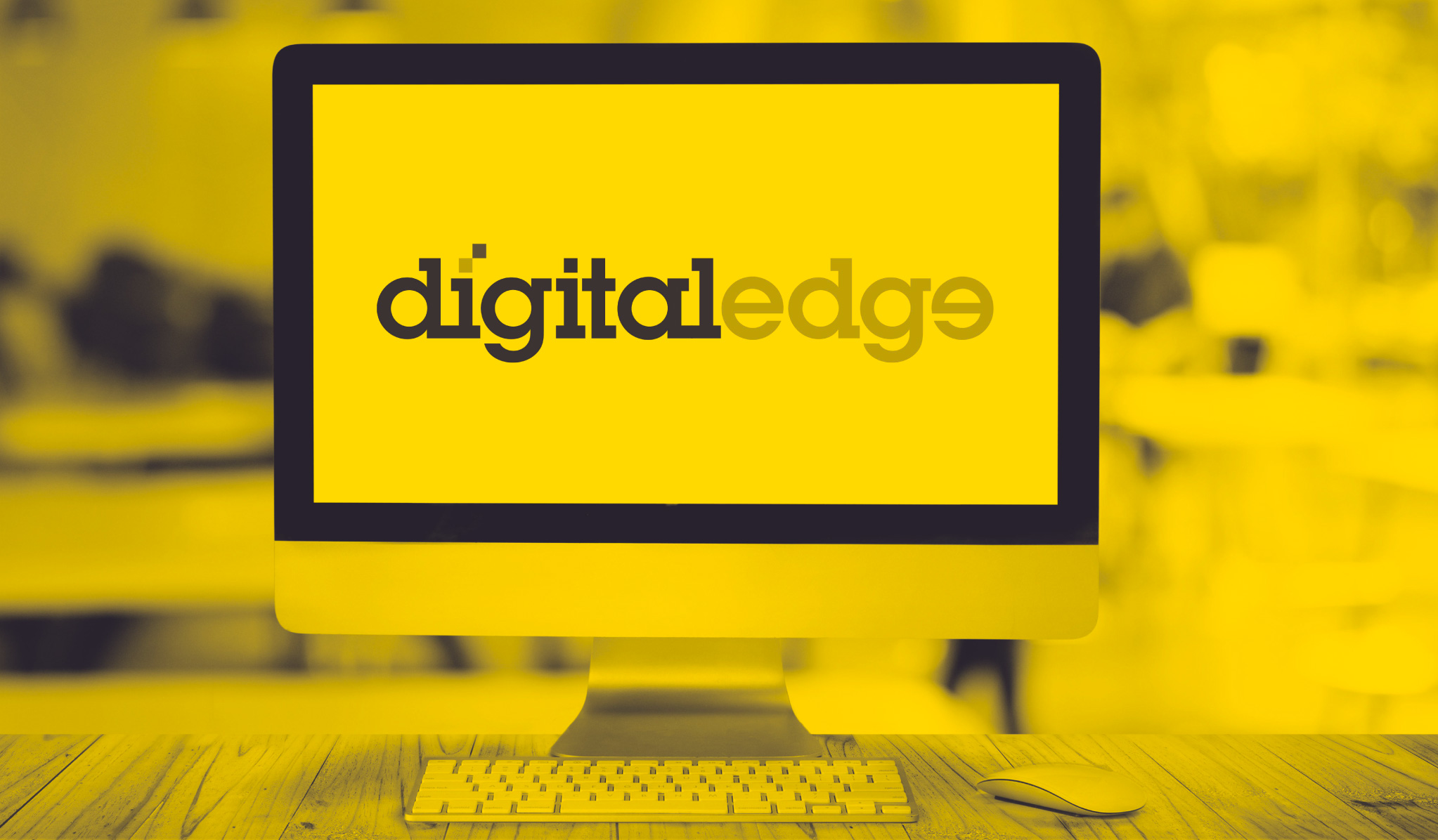 image of a desktop with the digital edge logo